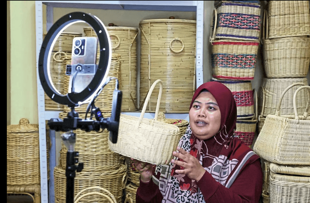 a rural Malaysian entrepreneur with local products